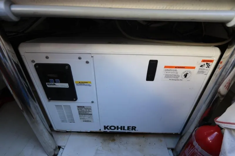 Slide: The Image of Kohler generator in a 2018 Canados Gladiator 428 yacht engine room. - 12