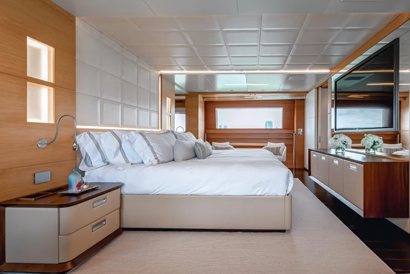 Slide: The Image of Luxurious bedroom interior on 2012 Benetti Classic Supreme 132 yacht, featuring elegant design and modern amenities. - 10