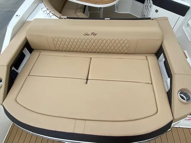Slide: The Image of 2023 Sea Ray SLX 310 OB boat with tan leather seating. - 39