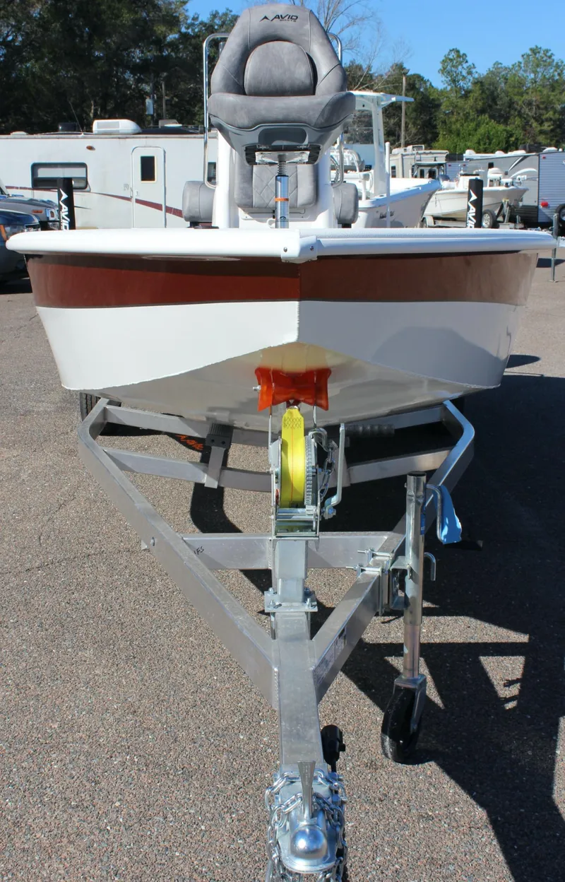 Slide: The Image of 2023 Avid 21 Mag boat on trailer, front view. - 16
