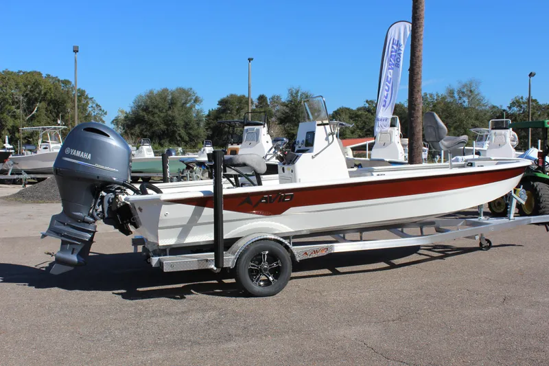 Slide: The Image of 2023 Avid 21 Mag boat on trailer with Yamaha outboard motor. - 2
