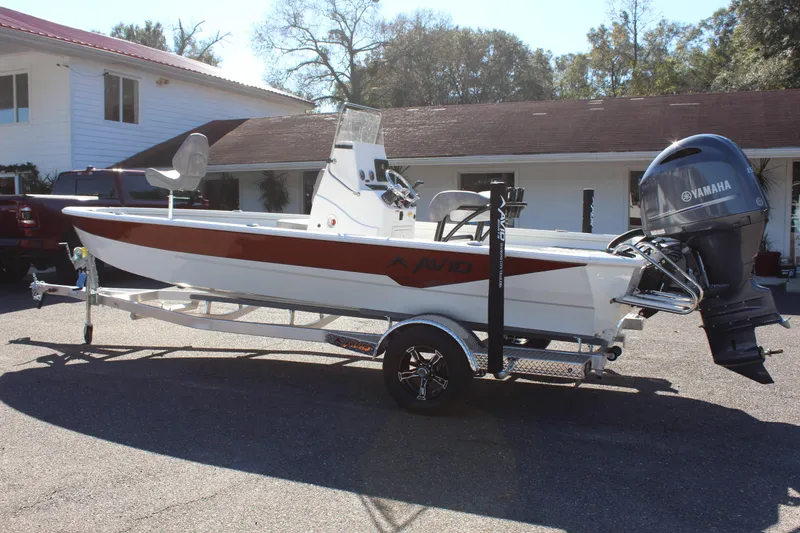 Slide: The Image of 2023 Avid 21 Mag boat on trailer with Yamaha outboard motor. - 5