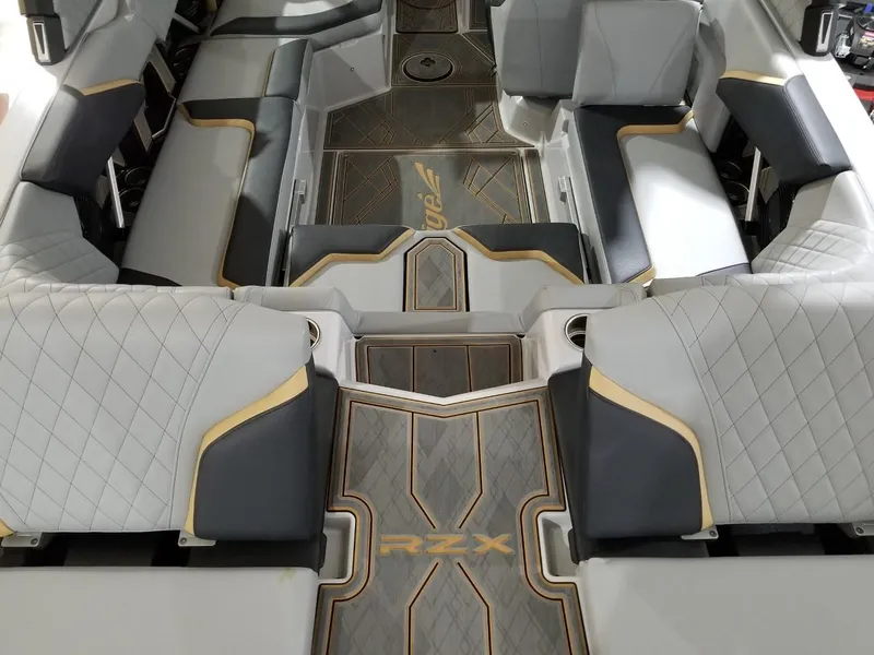 Slide: The Image of 2023 Tigé 22RZX boat interior with luxurious seating and stylish design. - 3