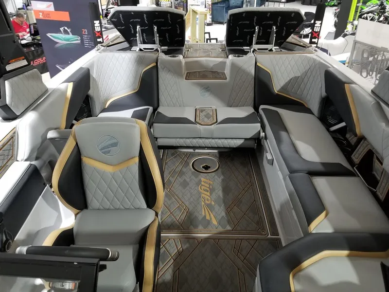 Slide: The Image of 2023 Tigé 22RZX boat interior with luxurious seating and modern design. - 4