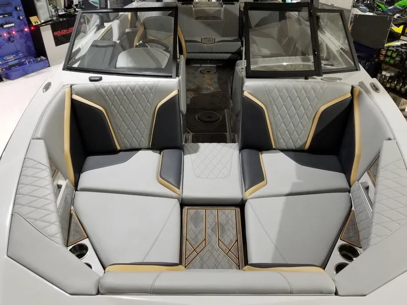 Slide: The Image of 2023 Tigé 22RZX boat interior with luxurious seating and modern design. - 6