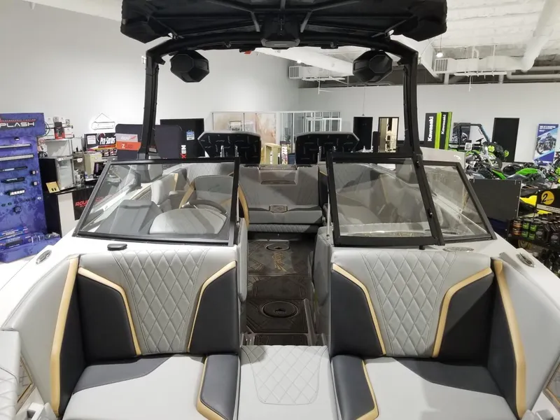 Slide: The Image of 2023 Tigé 22RZX boat interior with luxurious seating and modern design. - 8