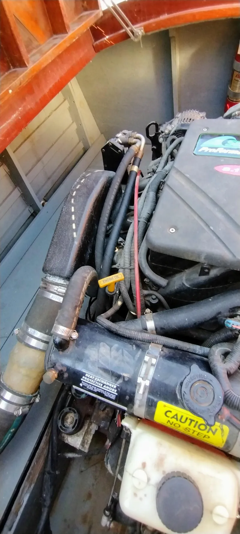 Slide: The Image of Engine compartment of a 1988 Hacker-Craft 30 Triple Cockpit boat. - 17