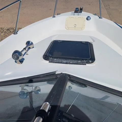 Slide: The Image of 1993 Bayliner Trophy boat bow with hatch and horn. - 4