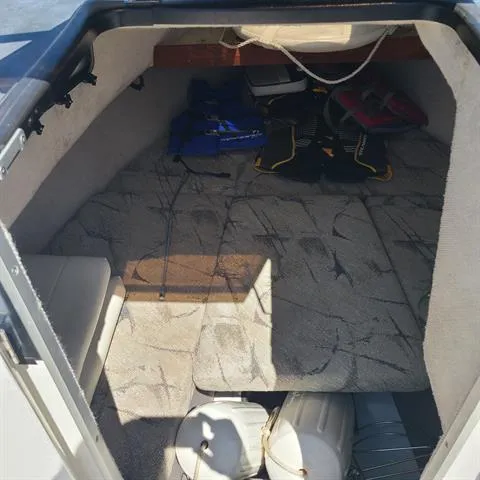 Slide: The Image of Interior cabin of a 1993 Bayliner Trophy boat with storage and equipment. - 6