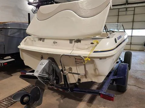 Slide: The Image of 2007 Glastron MX 175 boat on trailer in garage. - 5