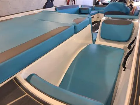 Slide: The Image of 2018 Heyday WT-2 boat interior with blue and gray seating. - 4