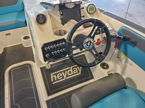 Slide: The Image of 2018 Heyday WT-2 boat dashboard with steering wheel and control panel. - 6