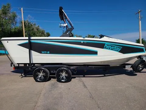 Slide: The Image of 2018 Heyday WT-2 boat on a trailer, side view, outdoors. - 8