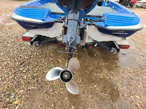 Slide: The Image of Rear view of a 2002 Javelin 200 DC boat with outboard motor and propeller. - 4