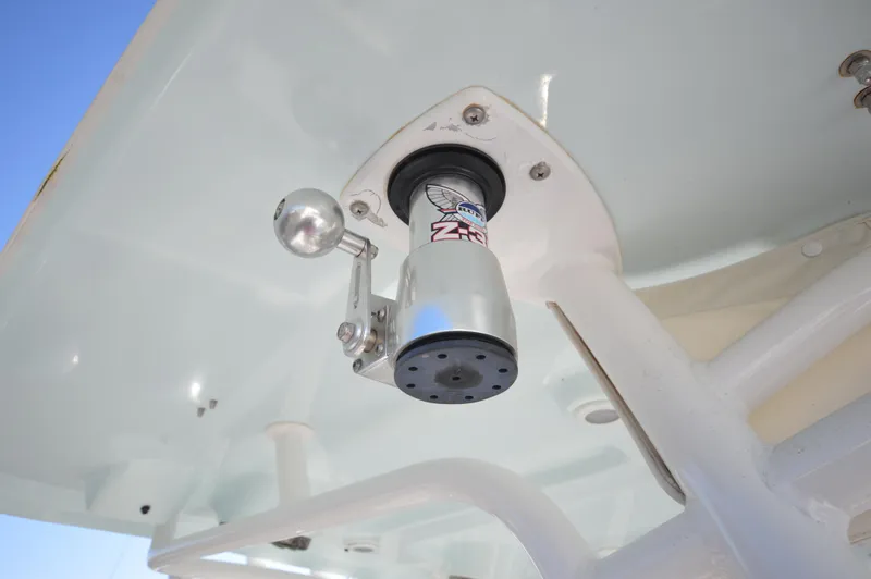 Slide: The Image of Close-up of a 2015 Sportsman 25 Center Console boat's T-top mount. - 10