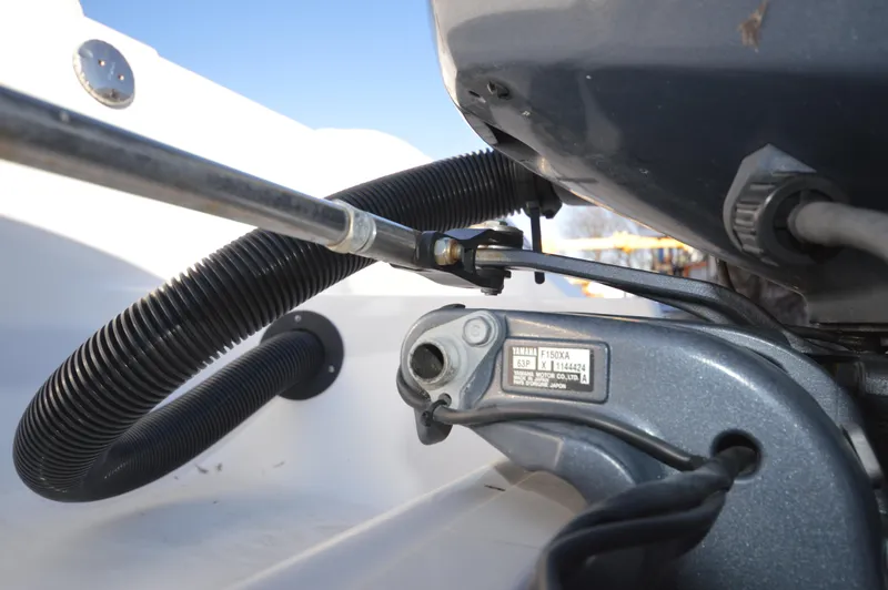 Slide: The Image of Close-up of 2015 Sportsman 25 Center Console boat engine components. - 16