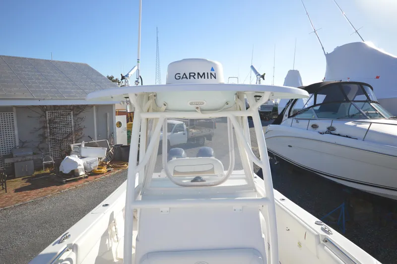 Slide: The Image of 2015 Sportsman 25 Center Console boat with Garmin navigation system. - 20