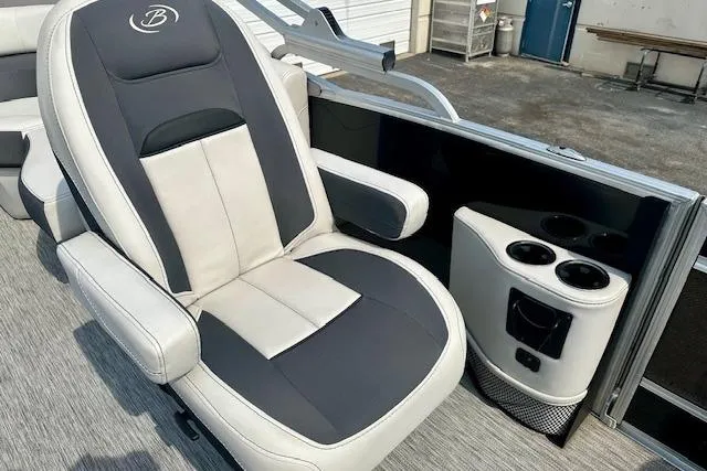 Slide: The Image of Captain's chair on 2022 Barletta Corsa 21QC pontoon boat with cup holders. - 20