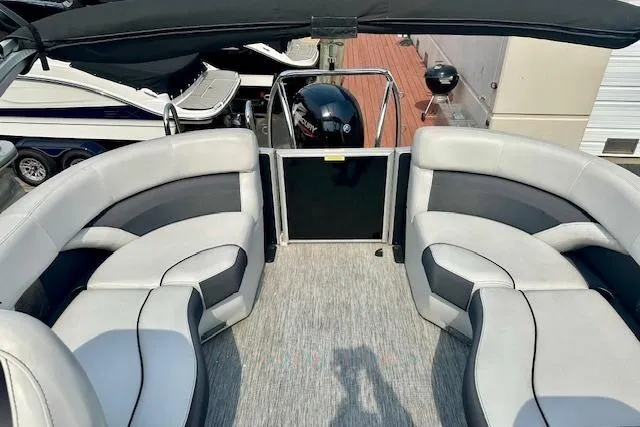 Slide: The Image of 2022 Barletta Corsa 21QC pontoon boat with spacious seating and modern design. - 22