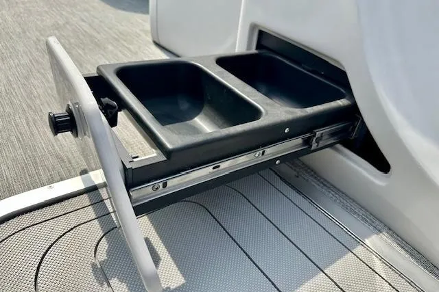 Slide: The Image of 2022 Barletta Corsa 21QC boat with a pull-out storage compartment. - 29