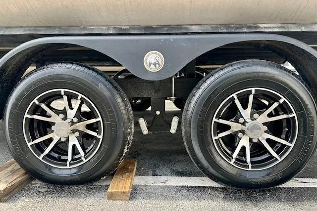 Slide: The Image of 2022 Barletta Corsa 21QC trailer wheels on wooden blocks. - 33
