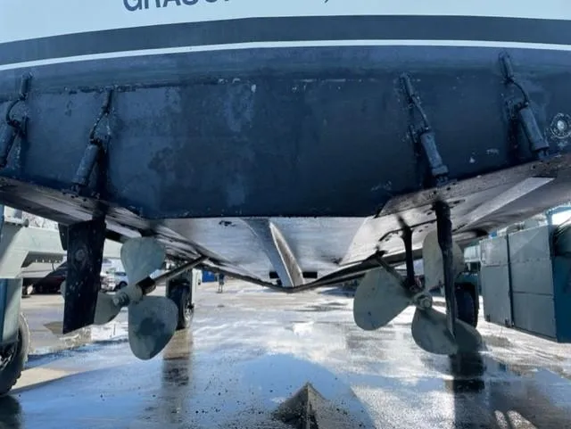 Slide: The Image of 1986 Viking 41 boat hull and propellers in dry dock. - 39