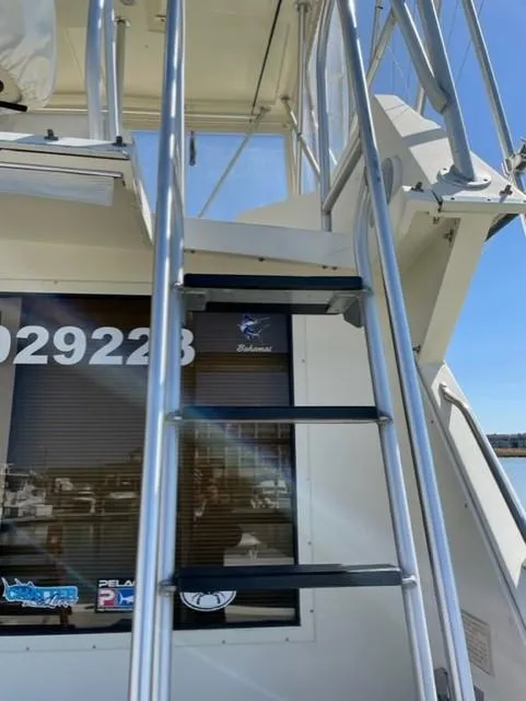 Slide: The Image of Staircase on a 1986 Viking 41 boat with marina background. - 4