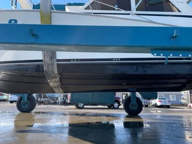 Slide: The Image of 1986 Viking 41 boat on a trailer in a boatyard. - 40