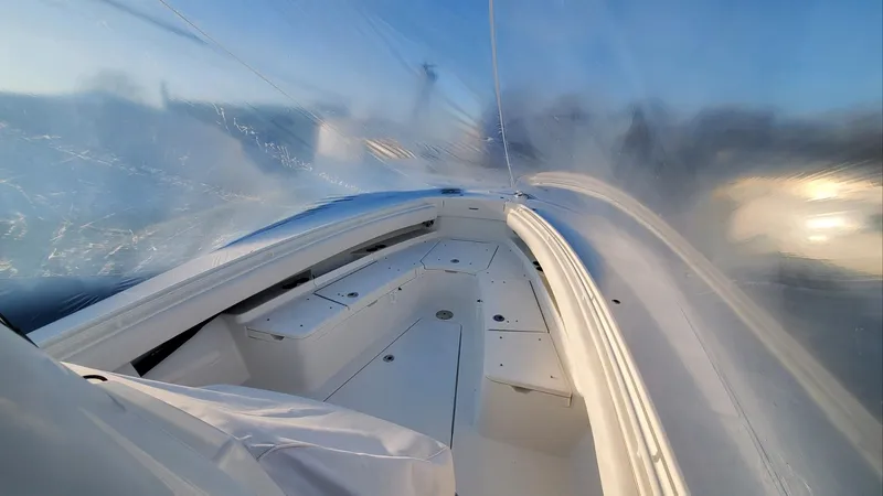 Slide: The Image of 2023 Regulator 28 boat interior with sleek design and spacious deck. - 13