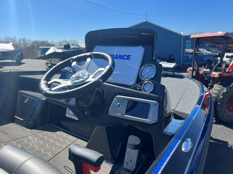 Slide: The Image of Nitro Z20 Pro 2023 boat dashboard with steering wheel and navigation system. - 5