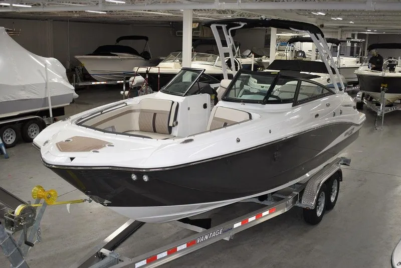 The Image of 2023 Monterey M6 boat on trailer in showroom. - 1