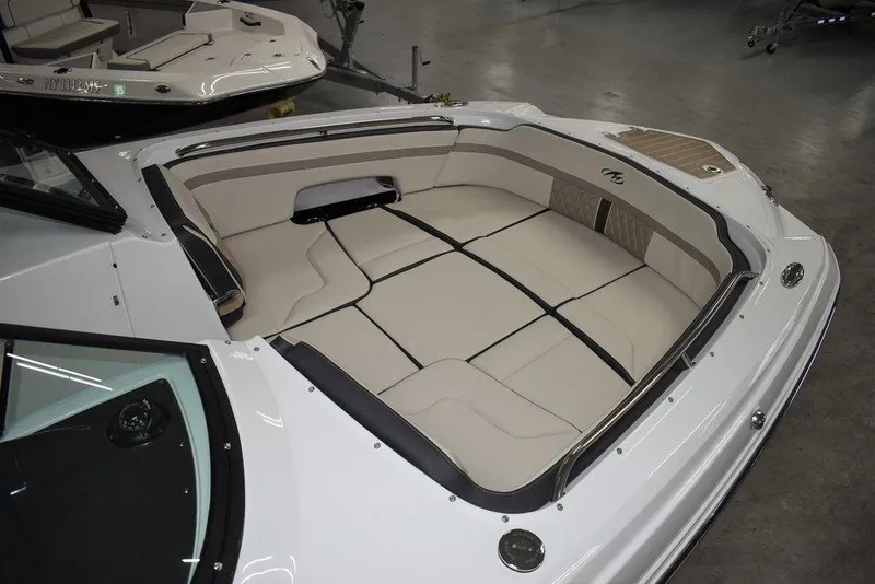 Slide: The Image of 2023 Monterey M6 boat with spacious bow seating area. - 13