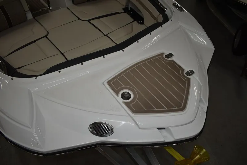 Slide: The Image of 2023 Monterey M6 boat with beige seating and white deck. - 14