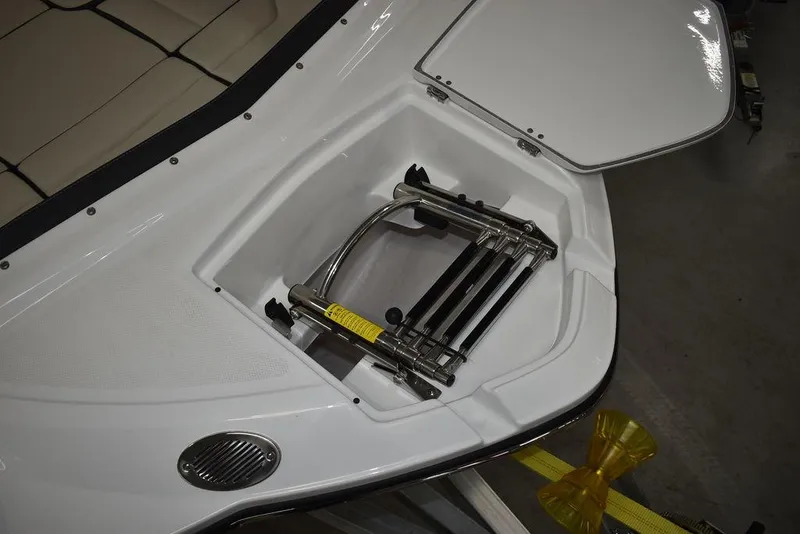 Slide: The Image of 2023 Monterey M6 boat with integrated swim ladder in storage compartment. - 15