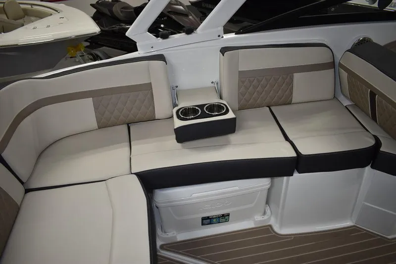 Slide: The Image of Luxurious seating area on the 2023 Monterey M6 boat with cup holders. - 31