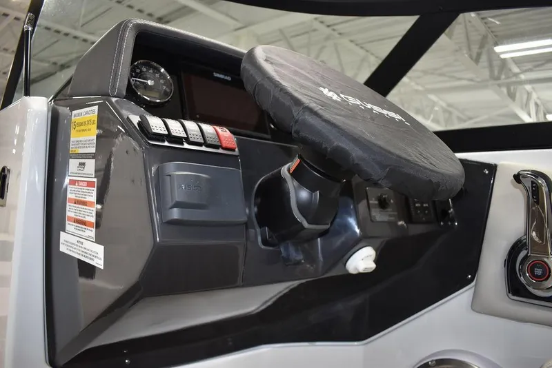 Slide: The Image of 2023 Monterey M6 boat dashboard with steering wheel and control panel. - 45