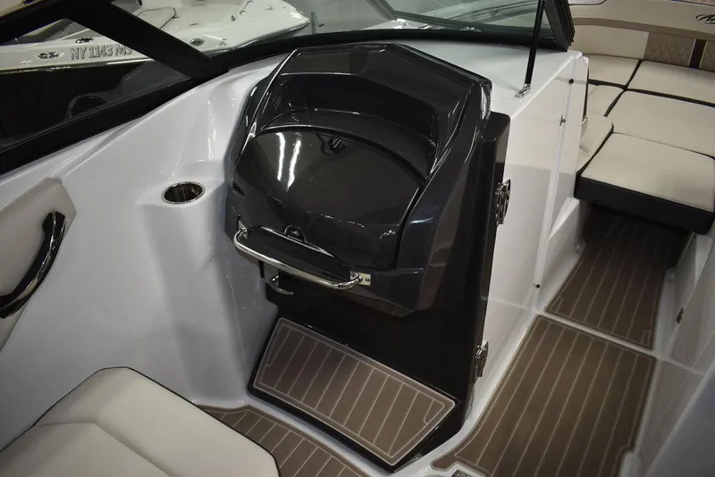 Slide: The Image of 2023 Monterey M6 boat interior with seating and storage compartments. - 49