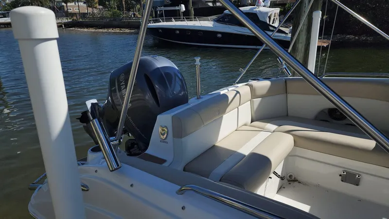 Slide: The Image of 2017 NauticStar 243DC Sport Deck boat with Yamaha outboard motor. - 11