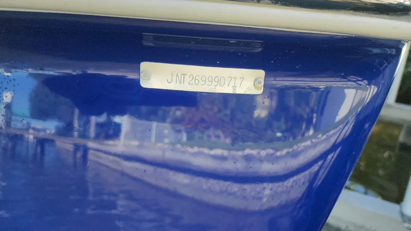 Slide: The Image of 2017 NauticStar 243DC Sport Deck boat hull identification number (HIN) plate. - 34
