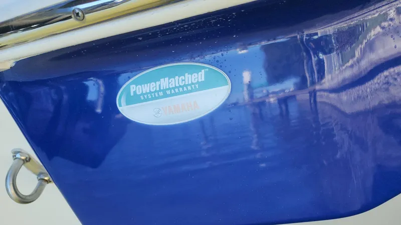 Slide: The Image of Close-up of 2017 NauticStar 243DC Sport Deck with PowerMatched Yamaha sticker. - 45