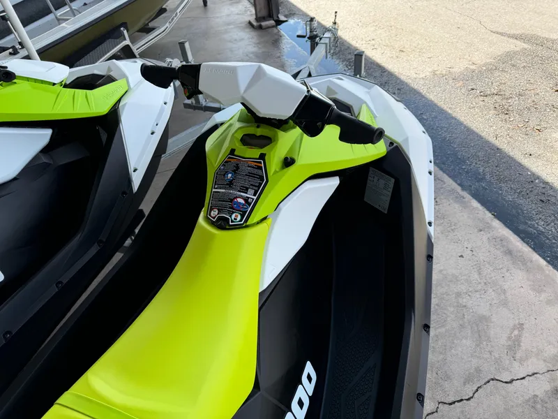 Slide: The Image of 2023 Sea-Doo Spark® 2-up Rotax® 900 ACE™ - 60, lime green jet ski, top view. - 3