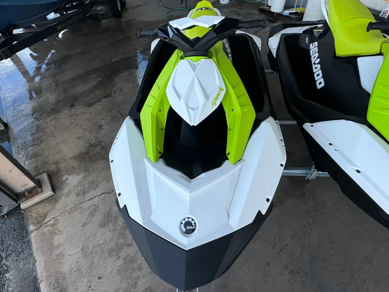 Slide: The Image of 2023 Sea-Doo Spark 2-up Rotax 900 ACE jet ski, lime green and white design. - 5