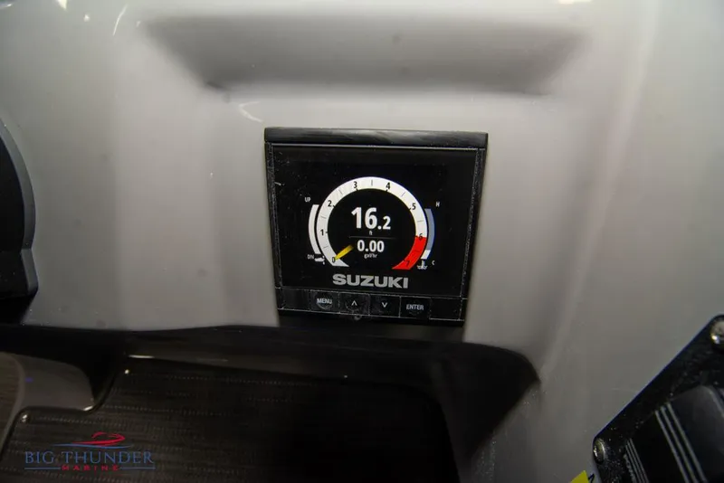 Slide: The Image of Suzuki gauge on 2022 Manitou 25 Oasis SR SHP boat dashboard. - 24