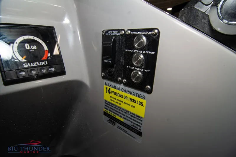 Slide: The Image of Control panel of 2022 Manitou 25 Oasis SR SHP boat with Suzuki gauge. - 26