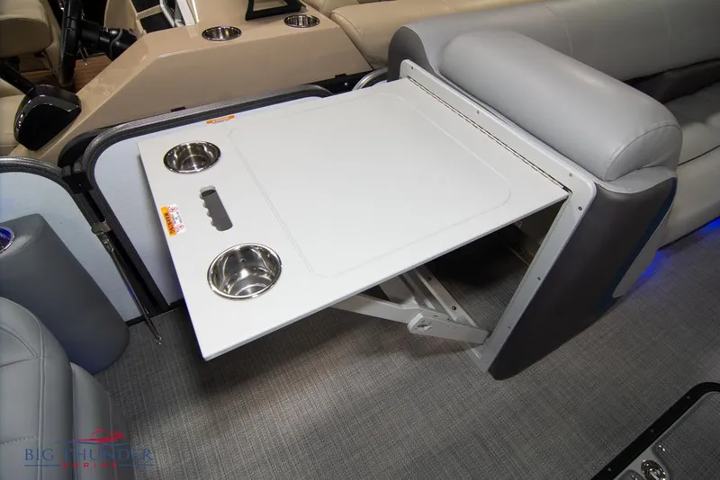 Slide: The Image of 2022 Manitou 25 Oasis SR SHP foldable table with cup holders. - 34