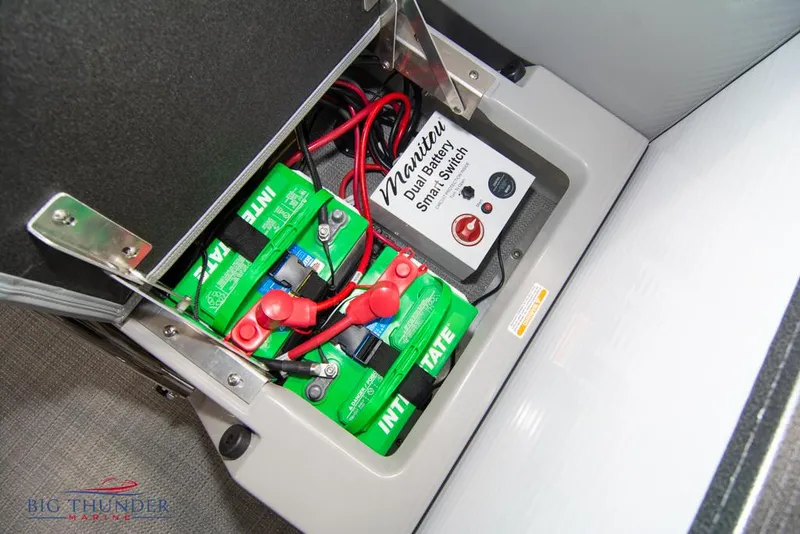 Slide: The Image of Battery compartment of a 2022 Manitou 25 Oasis SR SHP boat. - 44