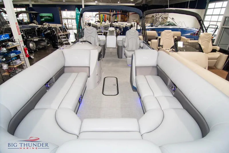 Slide: The Image of 2022 Manitou 25 Oasis SR SHP pontoon boat interior at Big Thunder Marine. - 9