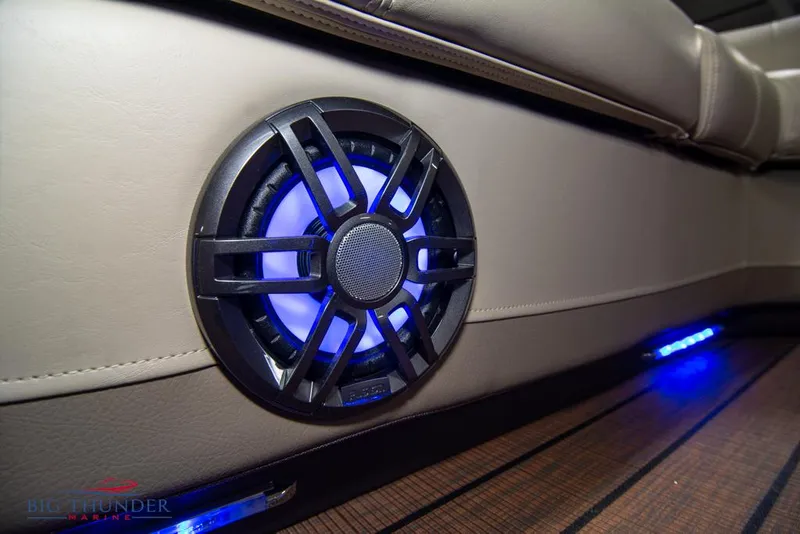 Slide: The Image of 2022 Manitou 25 Oasis SR SHP interior speaker with blue LED lighting. - 14