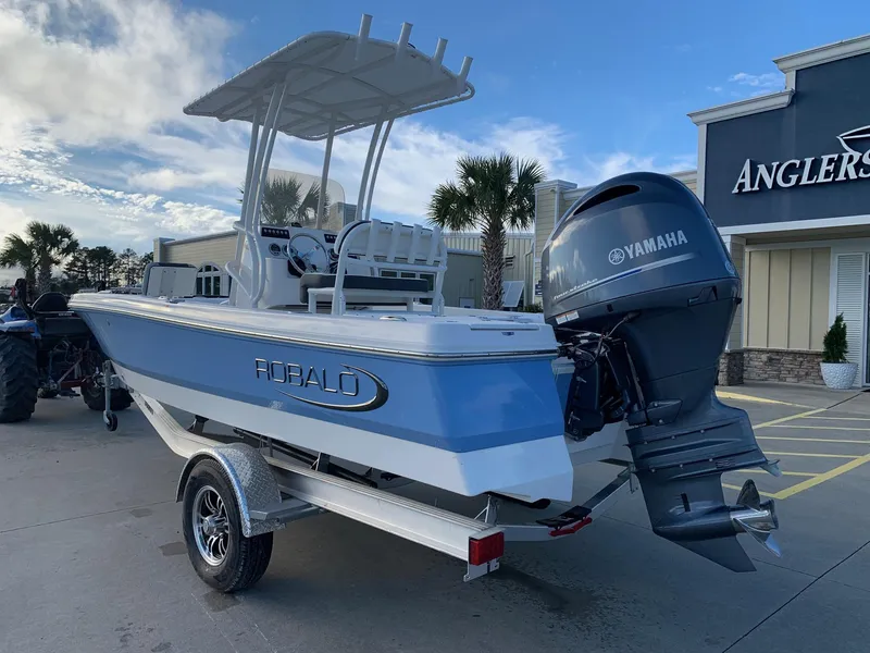 Slide: The Image of 2024 Robalo 206 Cayman boat with Yamaha outboard motor on trailer. - 1
