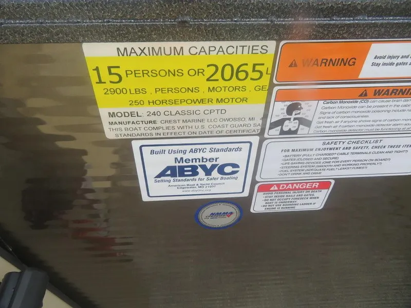 Slide: The Image of 2023 Crest Classic LX 240 SLC CPT boat capacity and safety labels - 9